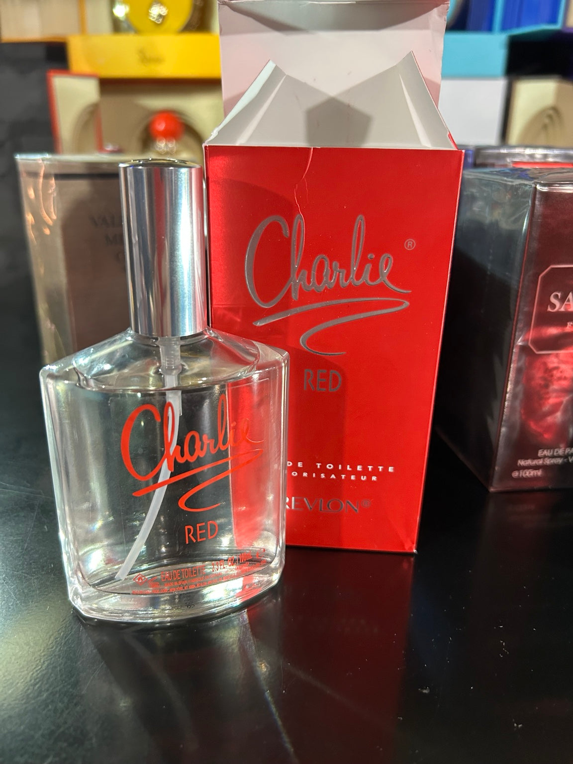 Actual donated Revlon Charlie Red 100ml Eau de Toilette bottle and box
